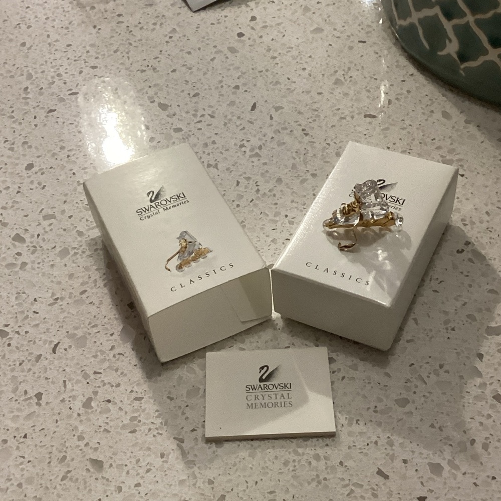 Swarovski Gold and crystal rollerblade figurine.